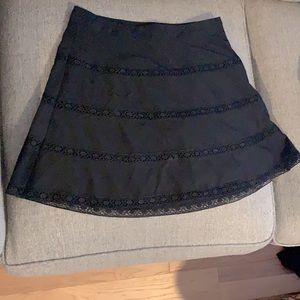 Black, lace detail skirt. The limited size 4